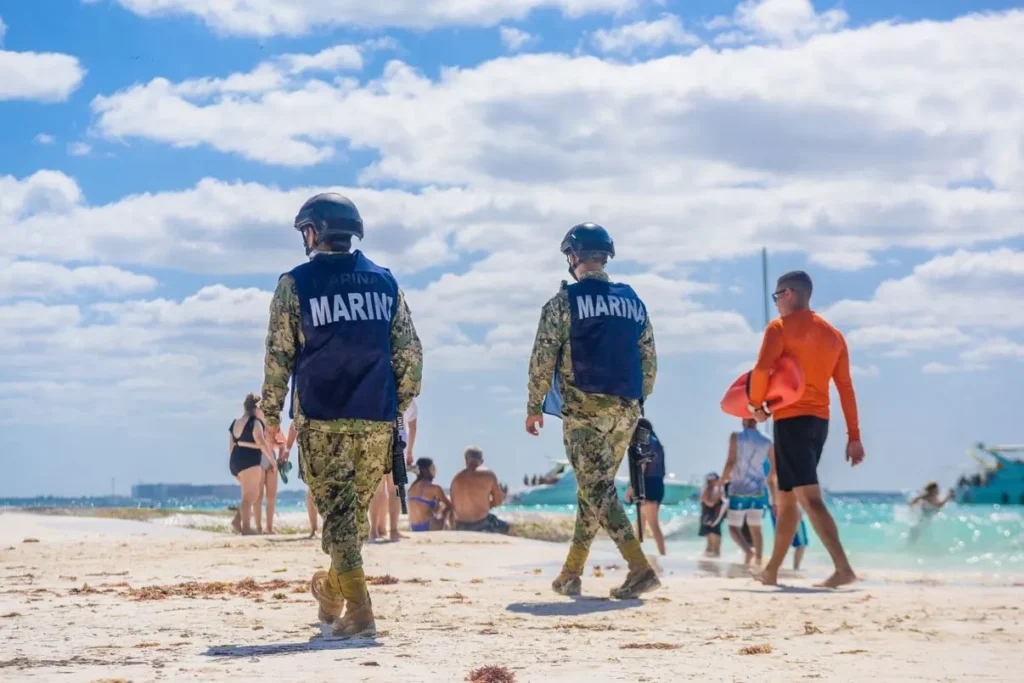 Navy and police patrolling Cozumel beach